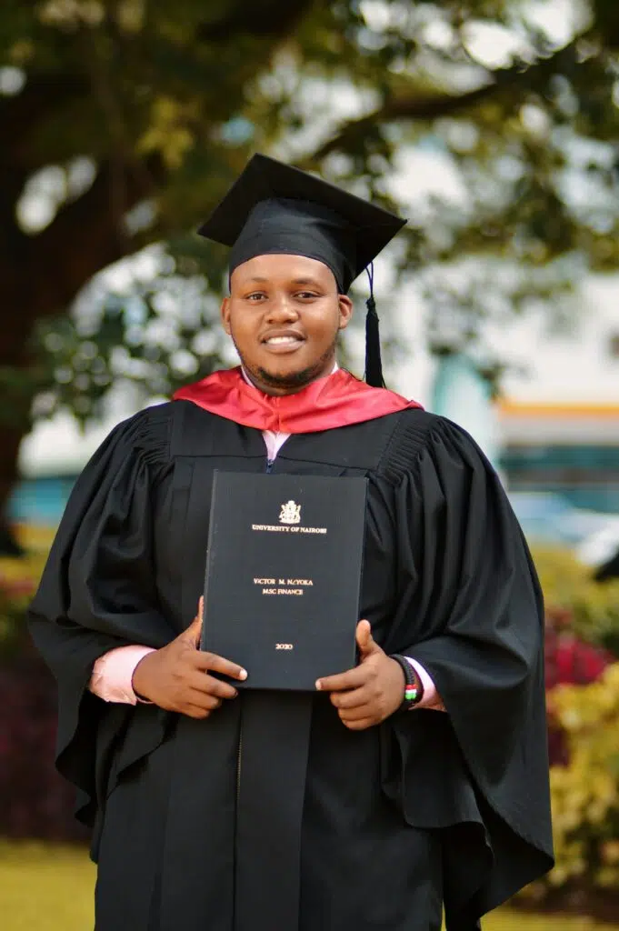 African graduate in cap and gown holding university degree representing JAMB 200 plus achievement