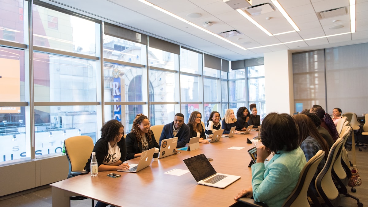 African students at laptops in a seminar room learning the new AI rules for assignments