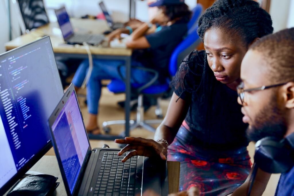 Nigerian learners in a coding workshop for free government skills training in Nigeria 2026