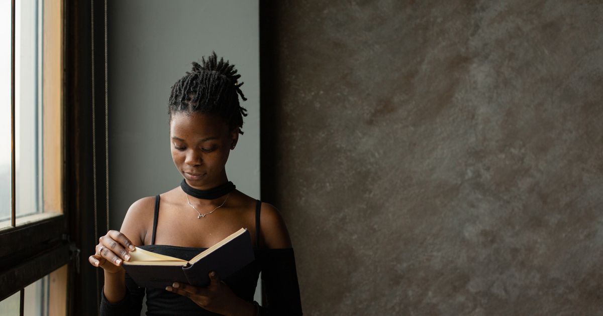 Nigerian student reading and preparing for Post UTME